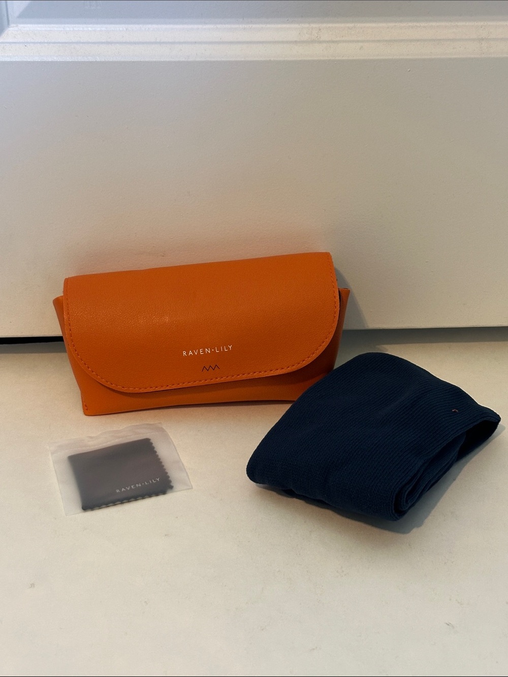 Raven + Lily Orange Sunglasses Case with Navy Cleaning Cloth